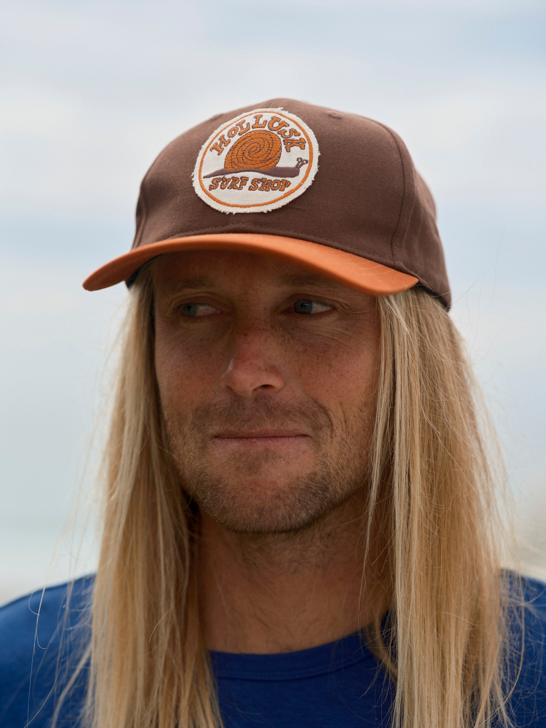 snail-patch-hat-brown-orange - description